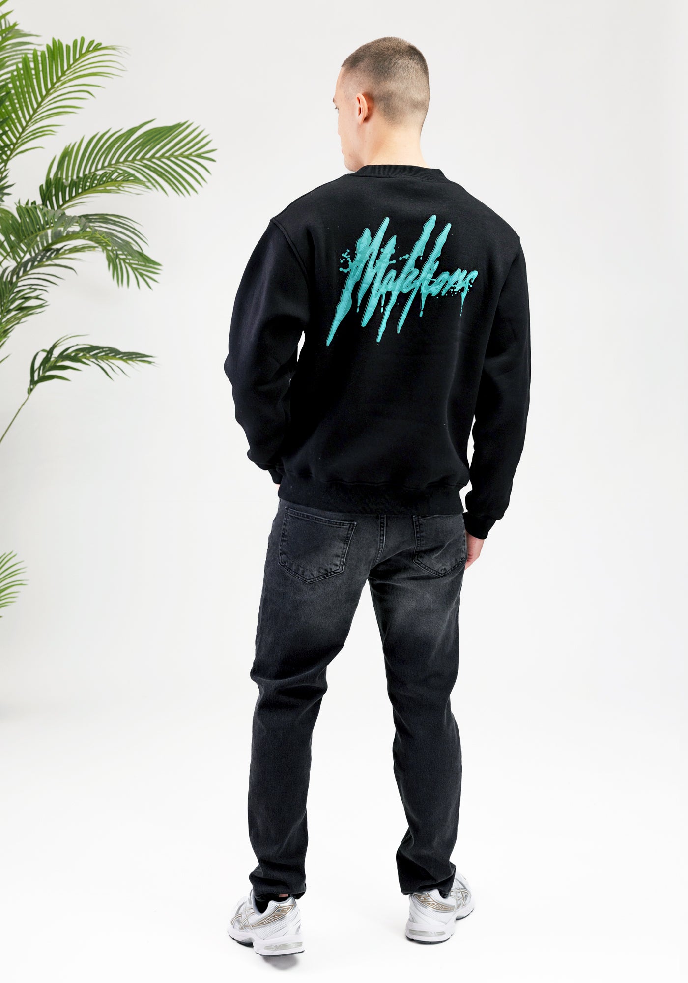 Cotton District MALELIONS SIGNATURE DRIP SWEATER BLACK