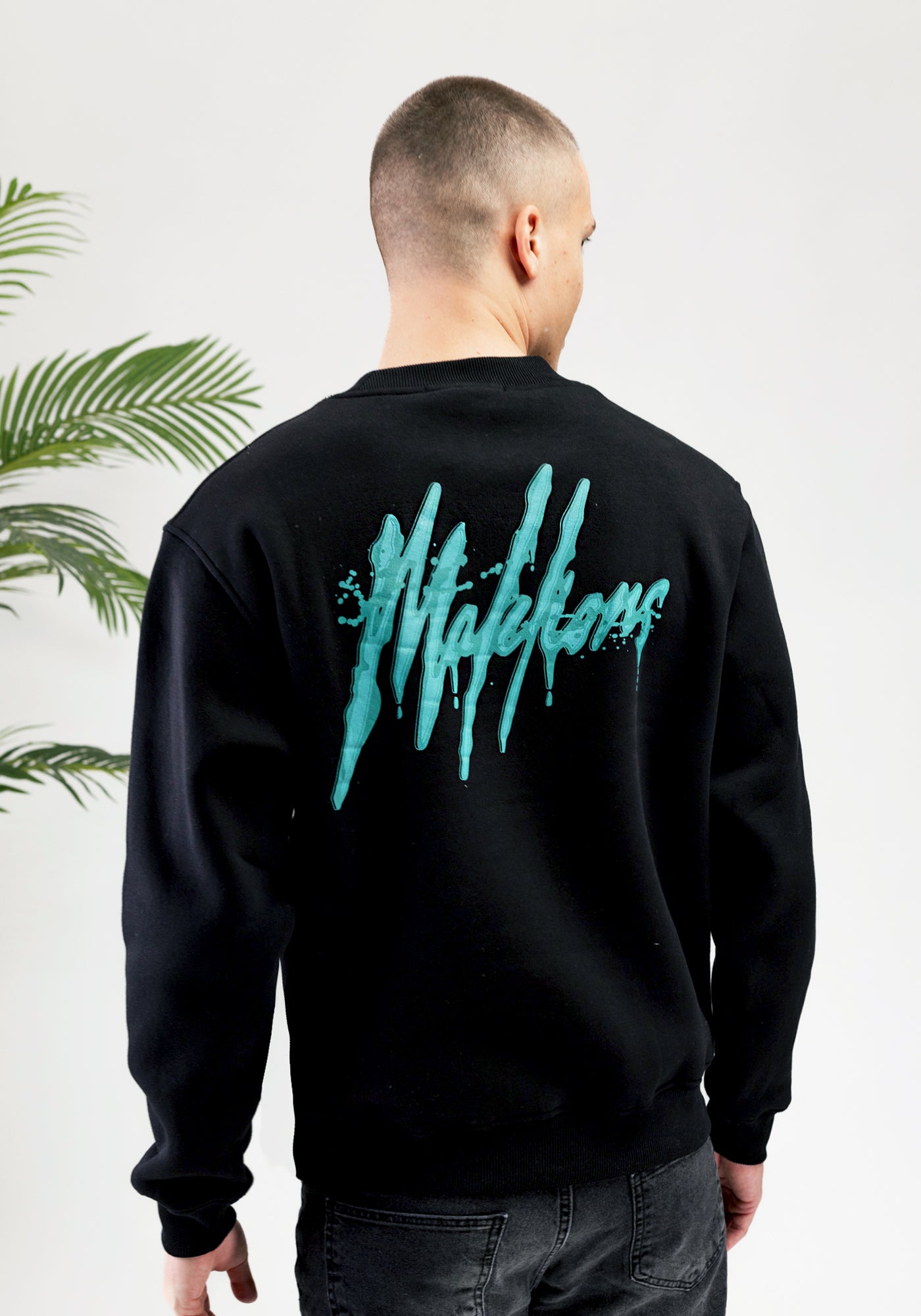 Cotton District MALELIONS SIGNATURE DRIP SWEATER BLACK