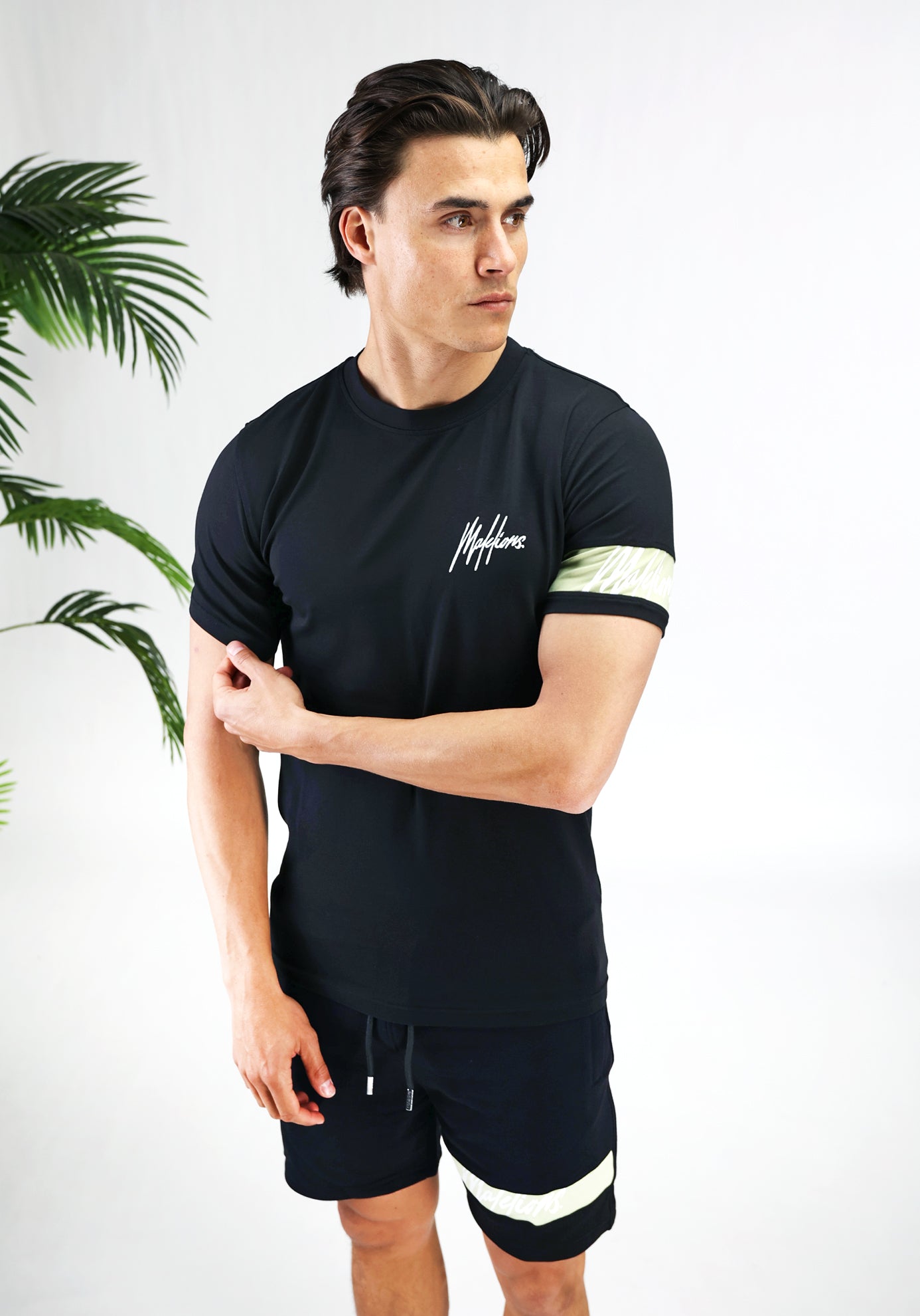 Cotton District MALELIONS CAPTAIN SET  BLACK/LIGHT GREEN