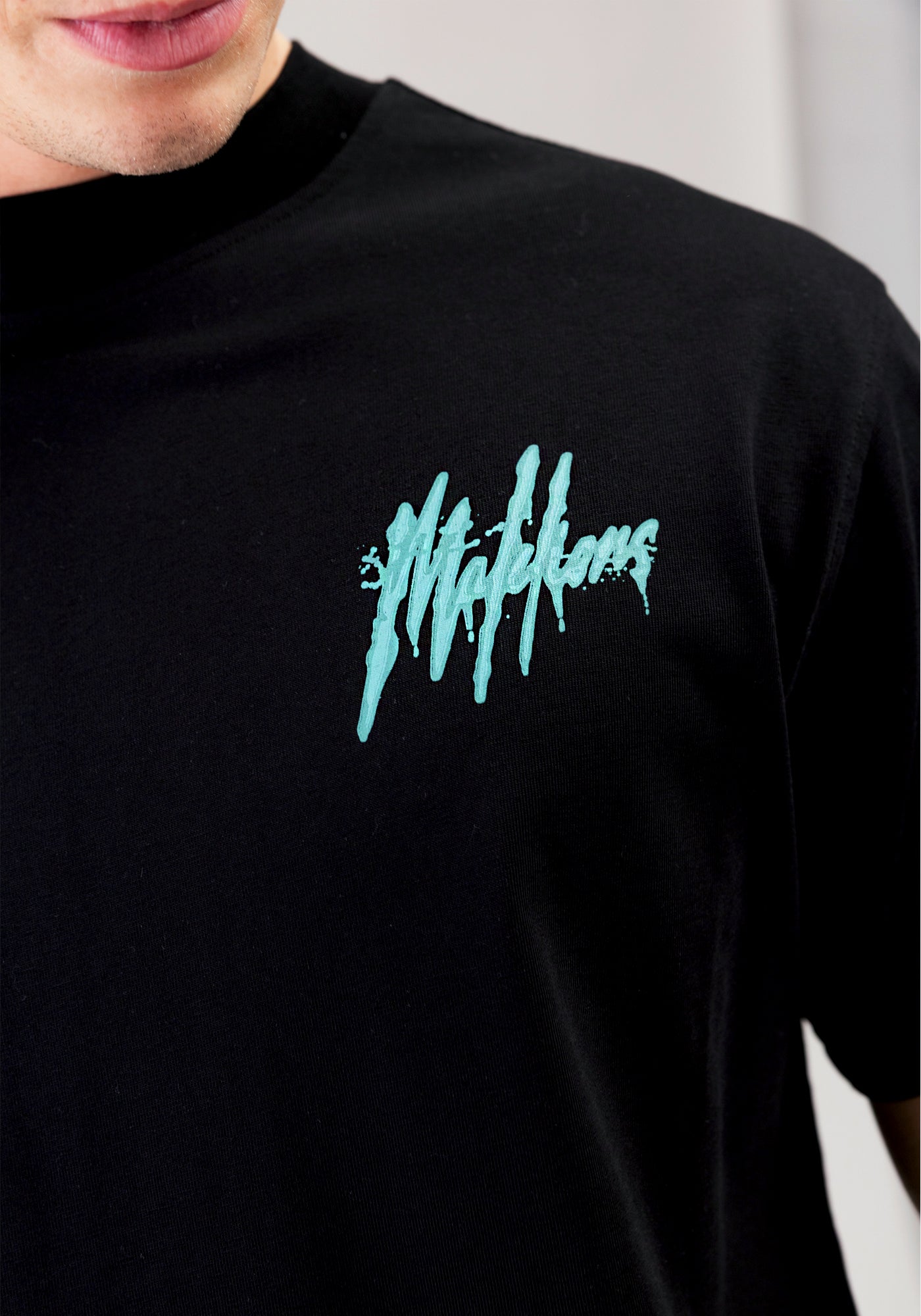 Cotton District MALELIONS SIGNATURE DRIP T-SHIRT  BLACK