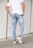 Cotton District TAPERED FIT JEANS  MID BLUE RIPPED