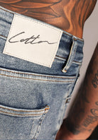 Cotton District TAPERED FIT JEANS  MID BLUE RIPPED