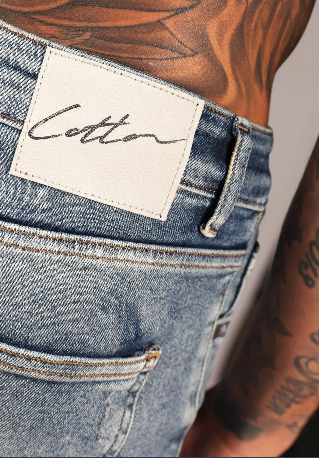 Cotton District TAPERED FIT JEANS  MID BLUE RIPPED